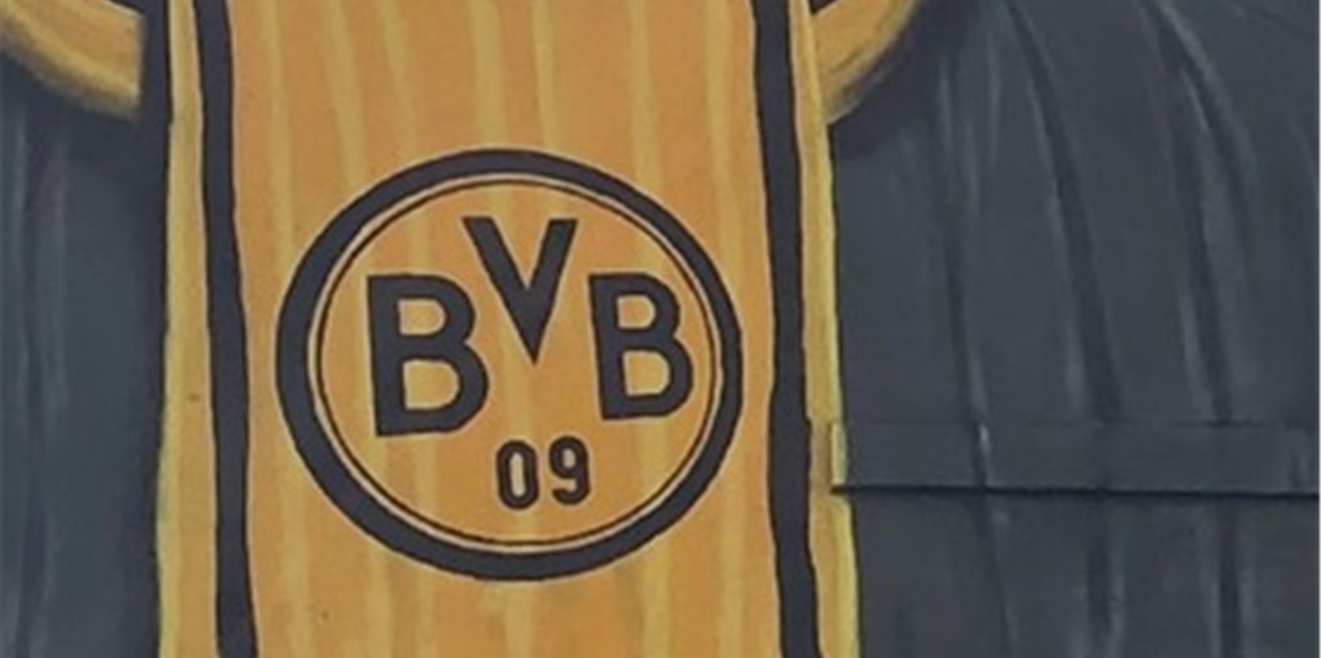 Der Schal mit dem alten BVB-Logo ist nur ein kleiner Ausschnitt des großen Wandbildes.