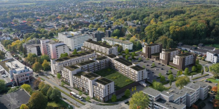 So würde die geplante Neubebauung der Turmarkaden-Fläche in Bergkamen aus der Vogelperspektive aussehen. Links unten am Bildrand ist das Kaufland-Gebäude und darüber das schon bestehende Hochhaus zu sehen. Von der Töddinghauser Straße aus soll ein Fußgängerbereich mit Bäumen ins das „Berg Karree“ führen.