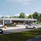 Der künftige Aldi-Markt soll nach Plänen des Unternehmens ein Flachbau werden. Auf der fotorealistischen Darstellung ist die östliche, an den Bruayplatz angrenzende Seite zu sehen.
