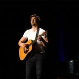 Comedian Lars Redlich mit Gitarre