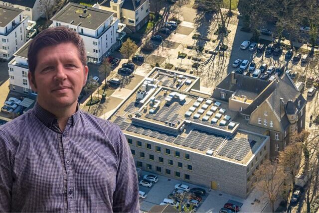 Stefan Thiel von der Gemeinde Holzwickede ist auf ein Luftbild von Holzwickede montiert.