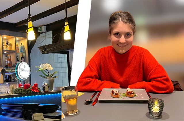 Sophie Schober an einem Tisch im Restaurant Primo Amore