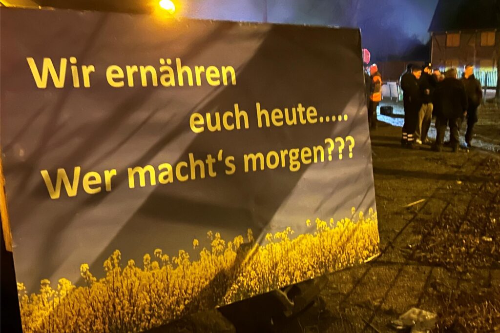 Schild mit der Aufschrift: "Wir ernähren euch heute... Wer macht´s morgen?"