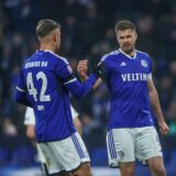 13.01.2024, Fussball, 2. Bundesliga, Saison 2023/2024,Testspiel, FC Schalke 04 – KAS Eupen, v. l. Keke Topp (FC Schalke 04), Simon Terodde (FC Schalke 04) jubeln.