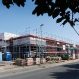 Montage aus Neubau für Rewe-Markt am Roggenkamp und Marktleiter Ugur Bayoglu