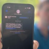 Auf einem Smartphone steht eine Nachricht von einer unbekannten Person.