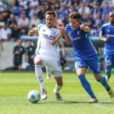 25.08.2024, Fussball, Saison 2024/2025, 2. Bundesliga, 3. Spieltag, 1. FC Magdeburg – FC Schalke 04, Kenan Karaman (FC Schalke 04), Jean Hugonet (1. FC Magdeburg)
