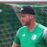 Sebastian Kramzik schaut nach vorne.