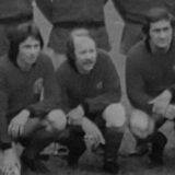 Eine Mannschaft in Schwarz-Weiß.