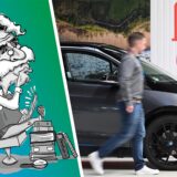 Ein Mann geht an einem E-Auto vorbei.