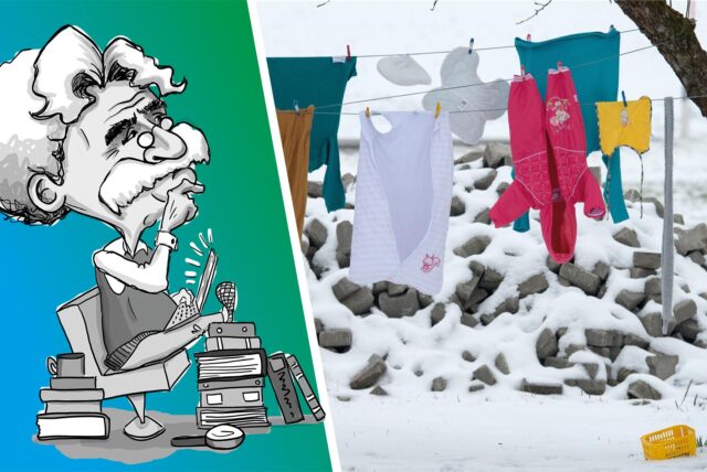 Wäsche hängt im Winter auf der Leine.