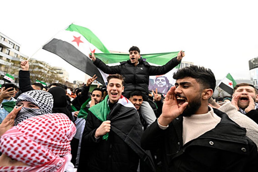 Syrer feiern in Essen den Zusammenbruch des Regimes von Präsident Assad und den Umsturz in Syrien. Syrer feiern in Essen den Zusammenbruch des Regimes von Präsident Assad und den Umsturz in Syrien.