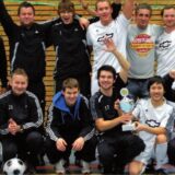 Eine jubelnde Fußballmannschaft.