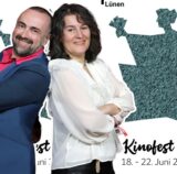 Nikolaj Nikitin und Sonja Hofmann leiten das 34. Kinofest Lünen. Im Hintergrund ist das Kino Cineworld zu sehen.