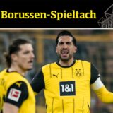 Emre Can hebt die Arme.