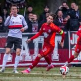 Die Spieler bejubeln einen Treffer.