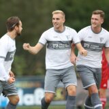 Robin Przybilla, Nico Holtmann und Jason Jäger vom Werner SC jubeln zusammen.