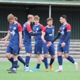 Spieler des BV Lünen jubeln auf dem Platz.
