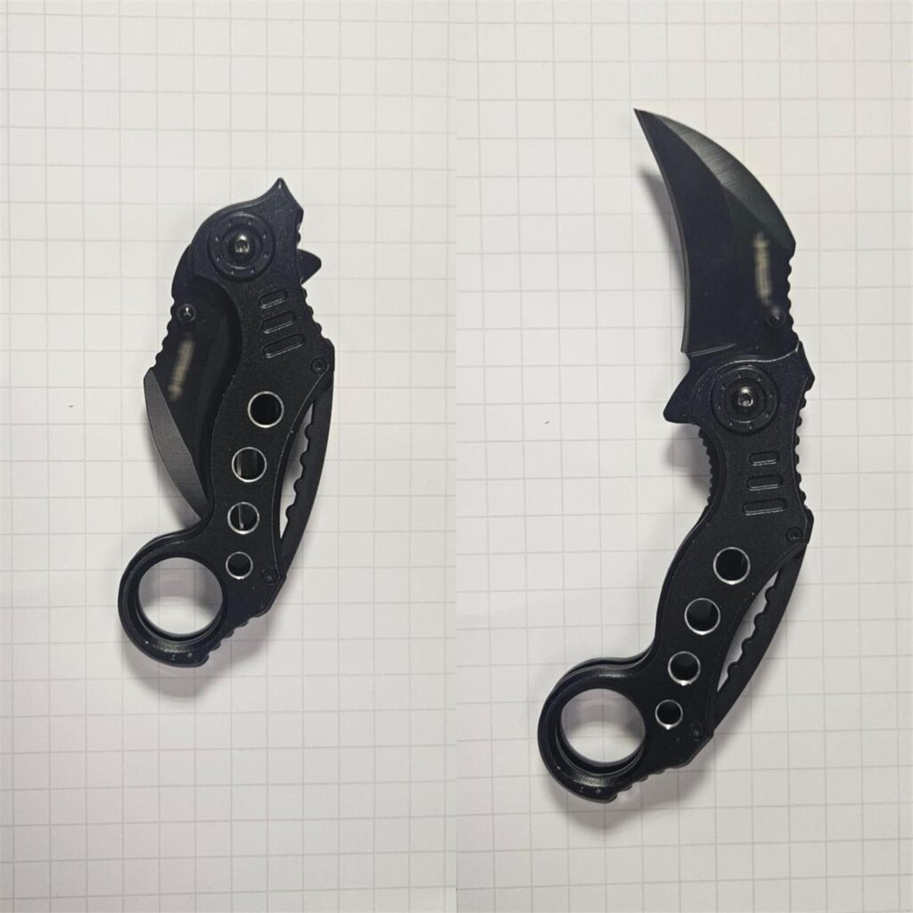 Ein Karambit-Messer Ein Karambit-Messer