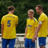 Spieler des SV Herbern stehen im Trikot auf dem Platz