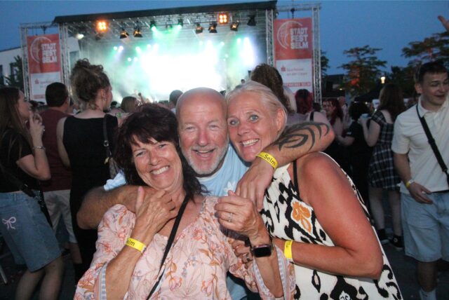 Drei Menschen beim Stadtfest 2025 in Selm