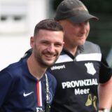 Im Trikot des amtierenden Champions-League-Siegers: Marcel Rose (vorne), hier neben Frömern-Coach Andy Feiler.
