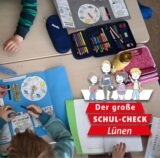 Schüler einer Grundschule arbeiten in einem Klassenzimmer in ihren Heften.