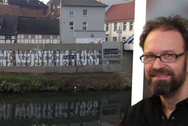 Kunstwerk auf Mauer und Künstler Markus Wengrzik