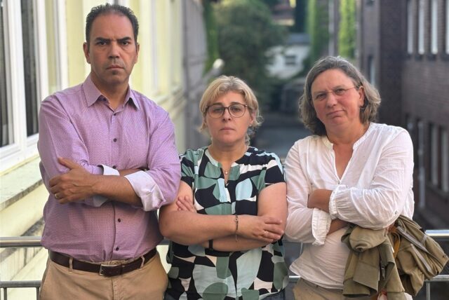 Paulo Pereira, Ana A. und Marika Bergmann blicken mit verschränkten Armen in die Kamera – die Anwohner wehren sich gegen den Drogenkonsumraum.
